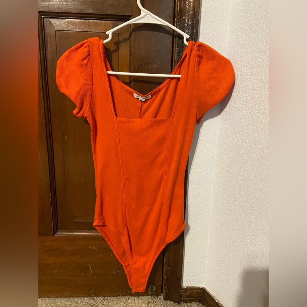 orange bodysuit